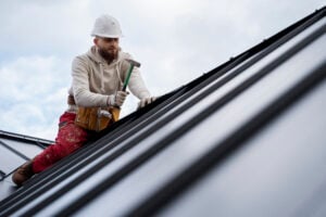 Professional gutter installation on residential roof in Tampa FL